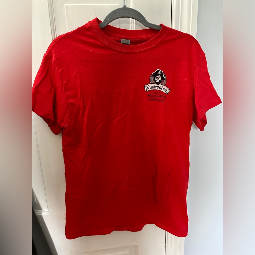 wrinkled from being folded; limited edition pirates cove adventure minigolf tee